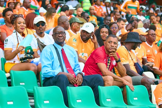 fans wearing team jerseys