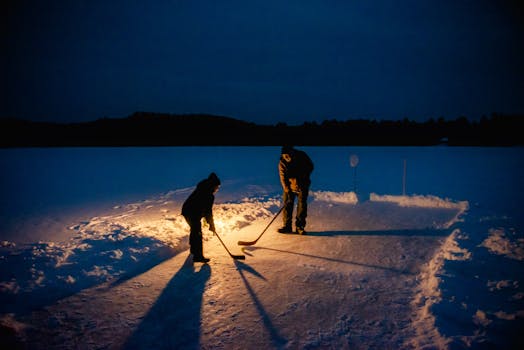 kids playing hockey on outdoor rink