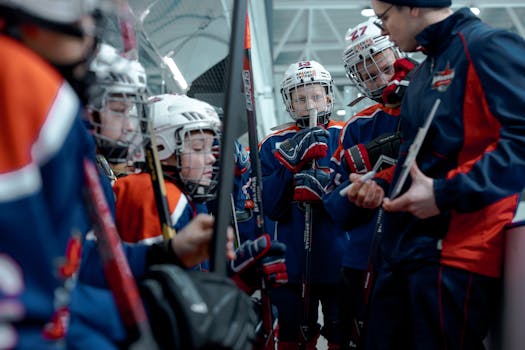 Hockey players mentoring youth