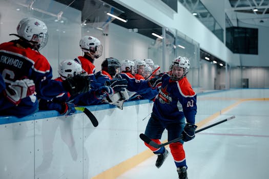 hockey team celebrating a goal