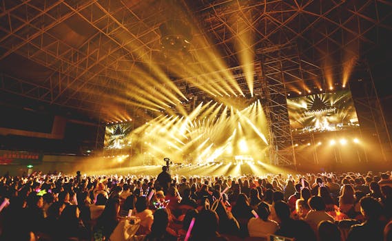 Fans cheering in a packed arena