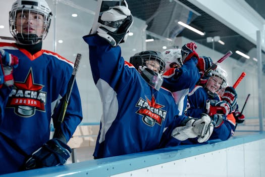 hockey players celebrating a goal